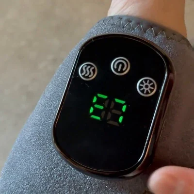 Close-up of the Stepeva control module with three backlit icons and the current level shown on screen